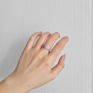 RENAE BAGUETTE AND ROUND DIAMOND RING