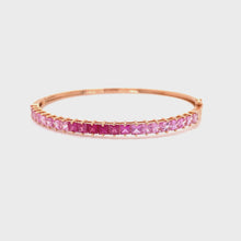 Load and play video in Gallery viewer, TIA PRINCESS CUT PINK SAPPHIRE ROSE GOLD BANGLE
